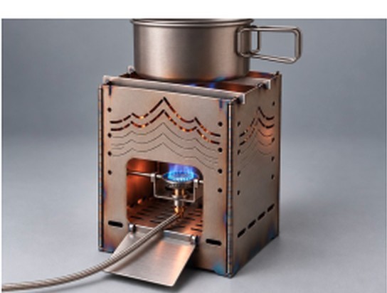 Design render of a gas burner inside the Stoke stove under a pot, with its hose running out through the door